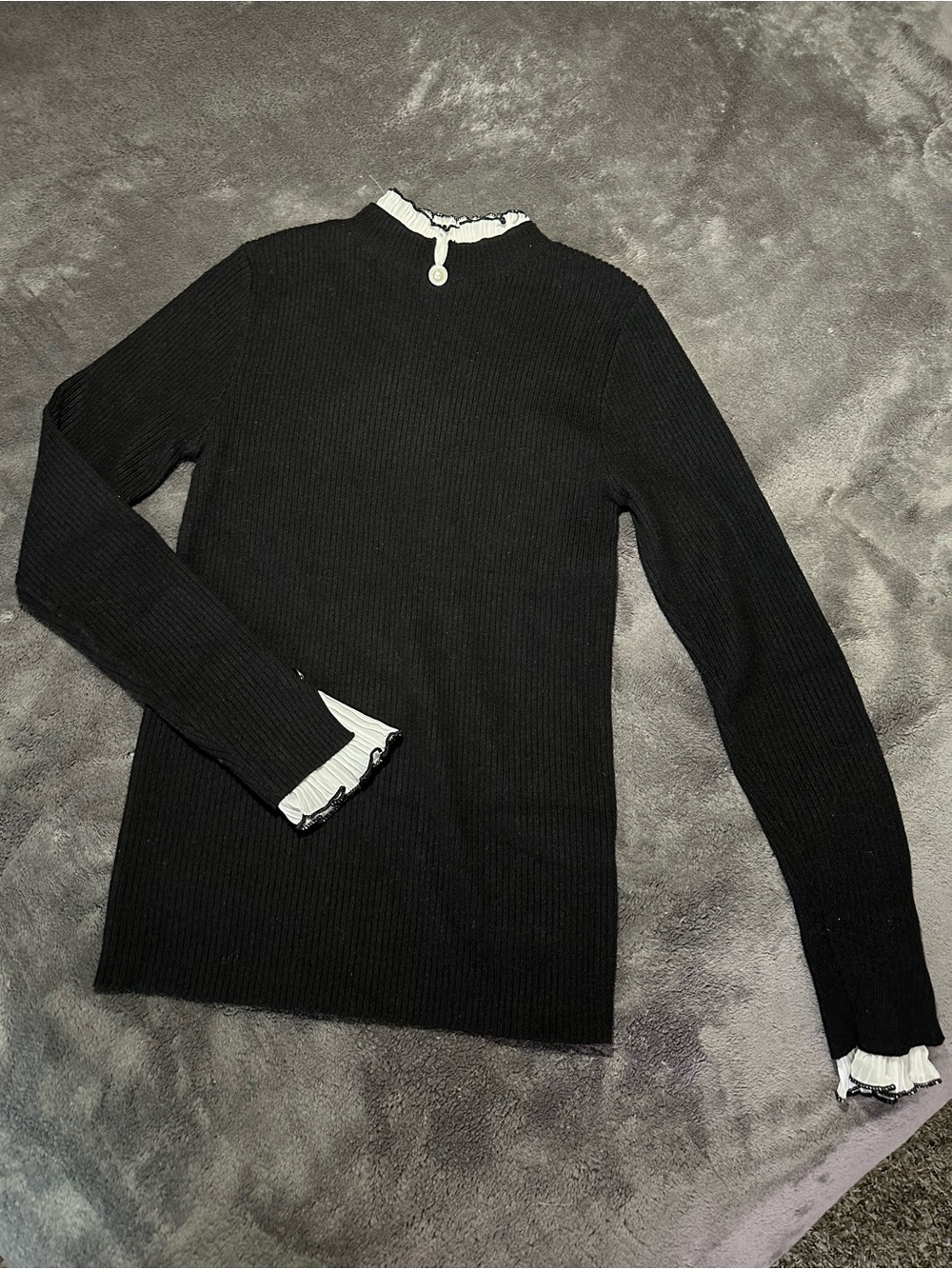 Black Ribbed Long-Sleeve Top with White Ruffle Trim